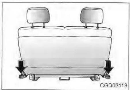 Diagram of a car seat with two top seats and two lower seats, showing directional arrows (no text or symbols)