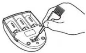 Hand using a screwdriver to adjust or install electronic components on a device (no text or symbols visible).