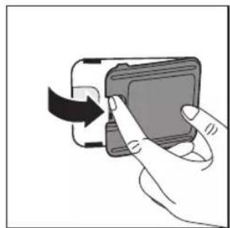 Hand inserting a card into a device (no text or symbols visible)