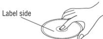 PANASONIC CQ-C5300W - How to hold the disc - 1