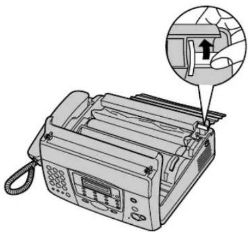 Illustration of a landline fax machine with a hand inserting a button into the right side (no text or symbols present)