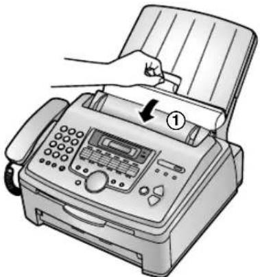 Illustration of a hand inserting a card into a printer (no text or symbols visible)