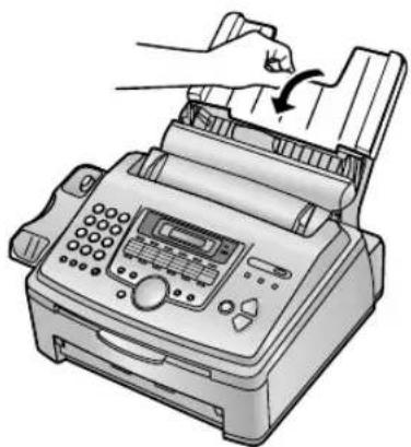 Illustration of a hand inserting a card into a printed circuit using a lathe (no text or symbols visible)