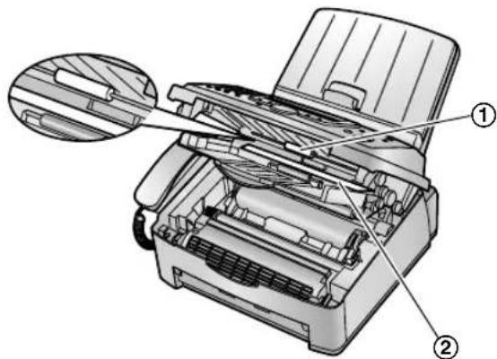Technical diagram of a printer with labeled parts, showing internal structure and zoomed-in detail view.