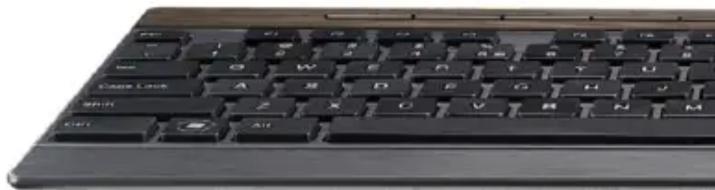 Close-up of a black computer keyboard with standard keys and control buttons (no visible text or symbols on the keys themselves)