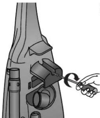 Illustration of a hand using a tool to adjust or install a mechanical component (no text or symbols visible).
