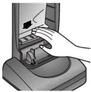 Illustration of a hand inserting a device into a slot machine (no text or symbols visible)