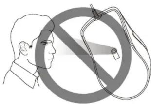 Diagram illustrating a prohibition symbol with a person's face and a crossed-out ring, likely for safety or surveillance.