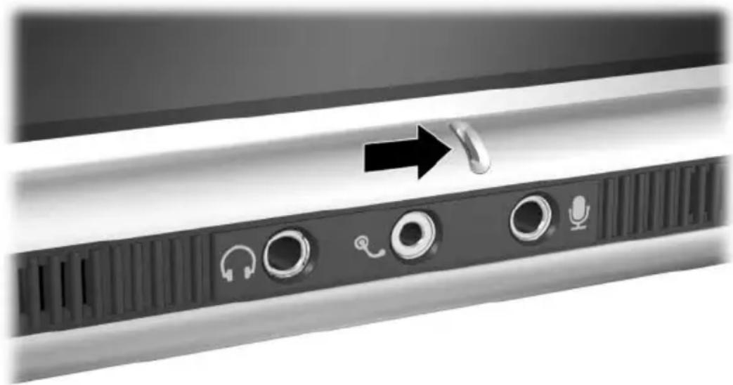 Close-up of a black electronic device panel with speaker icons and an arrow pointing to a connector (no text or symbols visible).