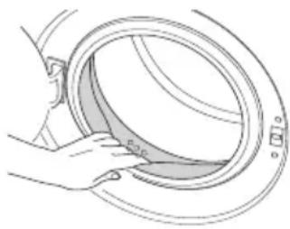 Line drawing of a hand opening a circular mechanical component (no text or symbols).
