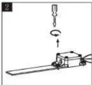 Diagram showing a screwdriver pressing a rotating component on a base, with no visible text or symbols.