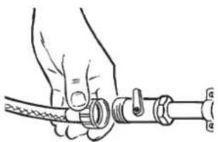 Illustration of a hand holding a coiled cable with a valve and connector (no text or symbols).