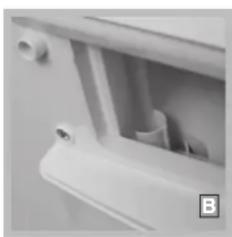 Close-up of a white plastic door handle with visible internal components and mounting holes (no text or symbols)