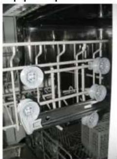 Interior view of an industrial facility with machinery and wiring (no visible text or symbols).