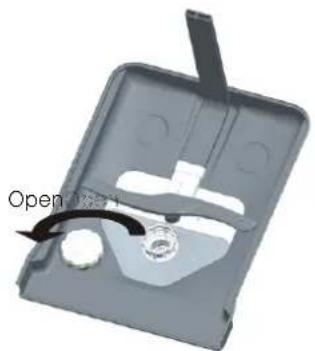 3D mechanical component diagram showing a tray with a handle and a central button, labeled 'Open' with an arrow pointing to a circular feature (no text or symbols beyond the label)