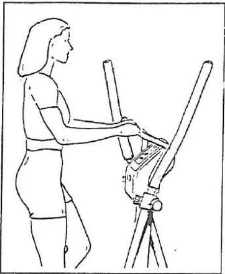 Line drawing of a person using an exercise machine on a tripod (no text or symbols)