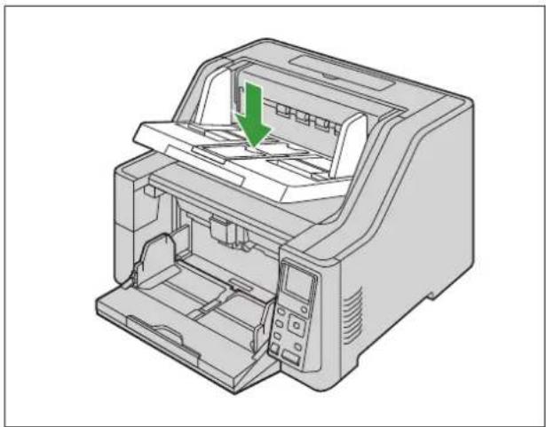 Illustration of a printer with a green arrow indicating a process or operation, showing internal structure and no text or symbols.