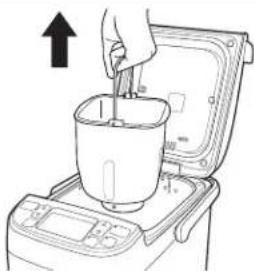 Illustration of a hand pouring liquid into a container using a stand mixer (no text or symbols)
