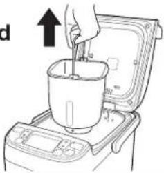Illustration of a hand pouring liquid into a cup on an appliance (no text or symbols)