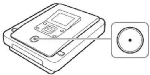 Line drawing of a device with a circular button and a screen, no text or symbols present