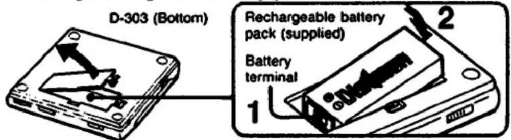 D-303 (dessous) Batterie rechargeable (fournie) Borne de batterie 1 2
