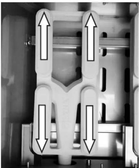 Mechanical component with four vertical arrows indicating upward and downward motion (no text or symbols)