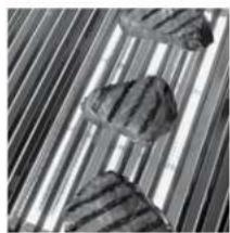 Abstract pattern of intersecting diagonal lines with textured shapes (no text or symbols)