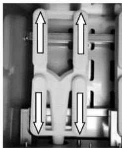 Mechanical component diagram showing symmetrical internal structures with four upward and downward arrows indicating direction (no text or symbols)