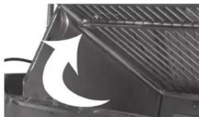 Close-up of a corrugated metal structure with a curved white arrow pointing left, no text or symbols visible.
