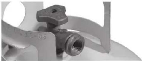 Close-up of a metallic valve assembly with flanges and a threaded port (no visible text or symbols)