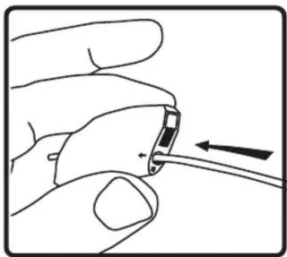 Hand holding a small electronic component with an arrow indicating direction (no text or symbols)