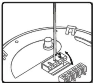 Mechanical assembly diagram showing a rotating component with a pin and base blocks (no text or symbols)