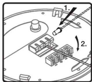 Technical diagram showing mechanical assembly with labeled parts and directional arrows