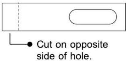 Cut on opposite side of hole.