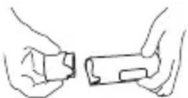 Line drawing of two hands holding a cylindrical object (no text or symbols)