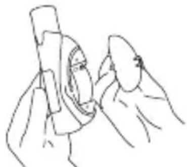 Line drawing of two hands holding a cylindrical object, no text or symbols present