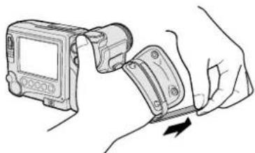 Illustration of a hand holding a smartwatch with a wrist strap, showing the device's grip and adjustment arrow (no text or symbols present)