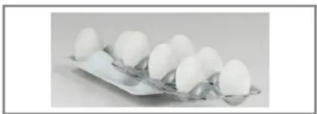 White eggs arranged on a metallic tray (no text or symbols visible)