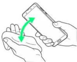 Illustration of two hands exchanging a smartphone, with green arrows indicating the direction of interaction (no text or symbols present)