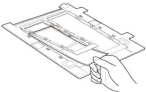 Line drawing of a hand holding a tray with internal compartments.