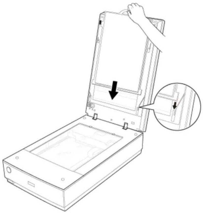 Line drawing of a device with an open lid and a hand holding the lid, showing a close-up of a detail (no text or symbols present).