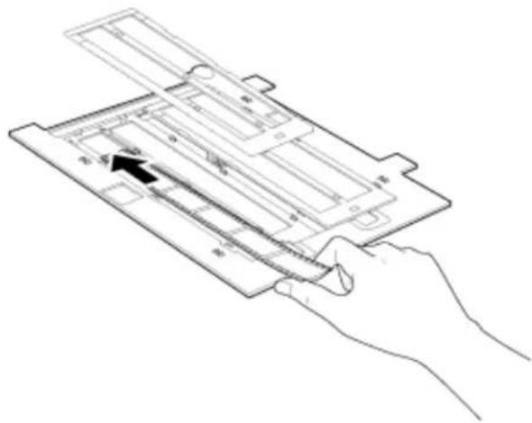 Line drawing of a hand holding a device with an arrow pointing to a component.