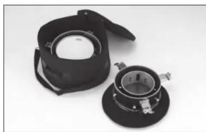 Two black mechanical components with circular and cylindrical features, no visible text or symbols