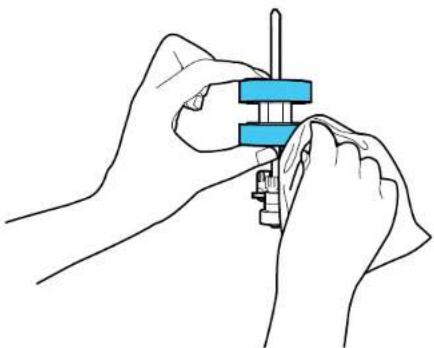 Line drawing of hands assembling a mechanical component (no text or symbols)