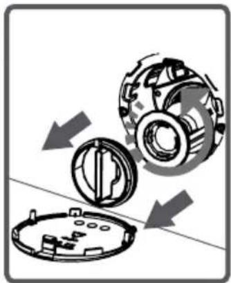 Mechanical assembly diagram showing a gear and housing with directional arrows indicating motion (no text or symbols)