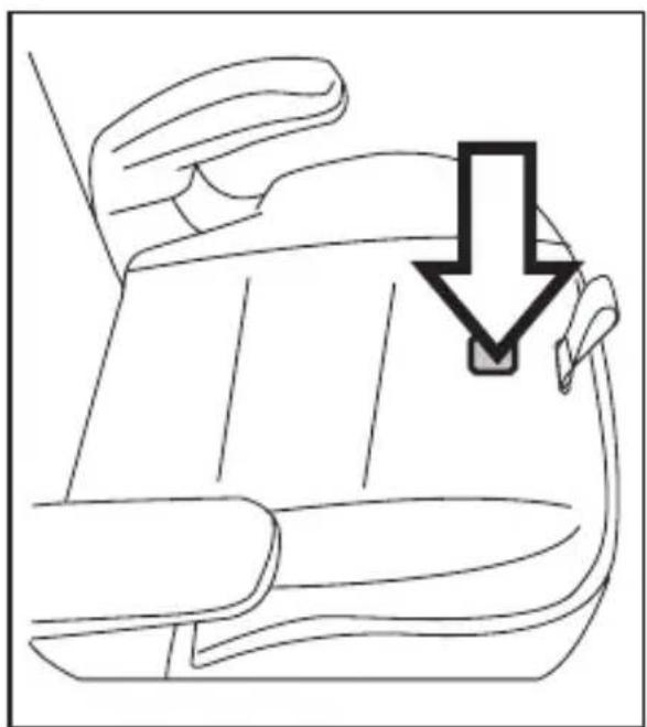 Line drawing of a car seat with a downward arrow indicating a drop or location (no text or symbols present)