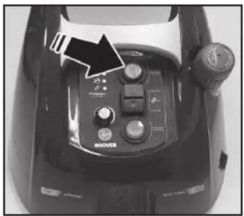 Vue de dessus du panneau supérieur d'un aspirateur robot noir avec des boutons de commande et une flèche directionnelle (aucun texte ou symbole sur l'appareil lui-même).