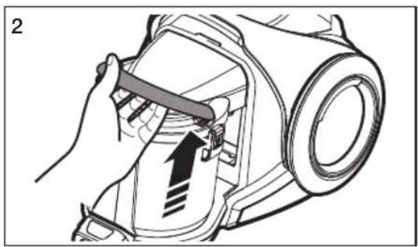 Illustration of a hand using a tool to adjust or install a mechanical component, with no visible text or symbols.