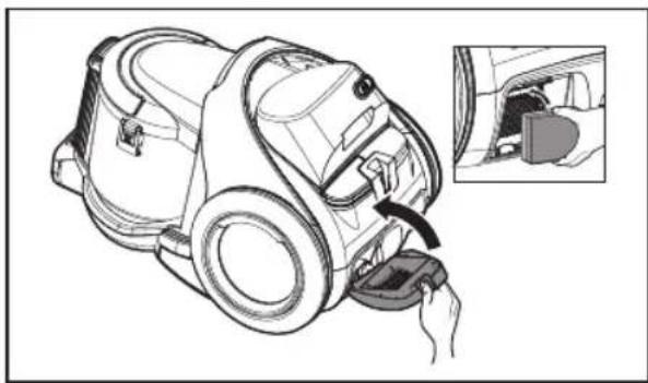 Line drawing of a vacuum cleaner with a hand inserting a component, showing internal components and a close-up inset (no text or symbols)