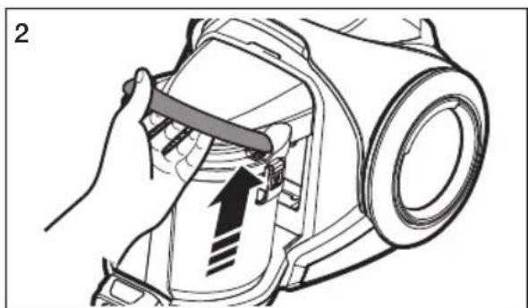 Illustration of a hand using a tool to adjust or install a mechanical component, with no visible text or symbols.